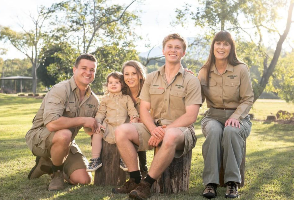 Bindi Irwin, Steve Irwin, Grace Warrior, Chandler Powell, and Terri Irwin posing for family photo. 